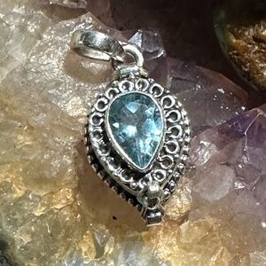 Blue topaz poison locket sterling silver pendant
